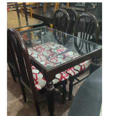 4 seater dining table with glass top ( Glass is scratch less)