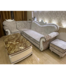 Carved design both on head of sofa and wooden leg to enhance look of sofa